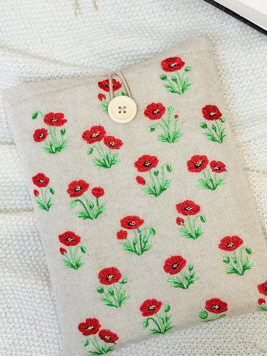 handmade embroidered poppy book sleeve with red flowers on linen fabric