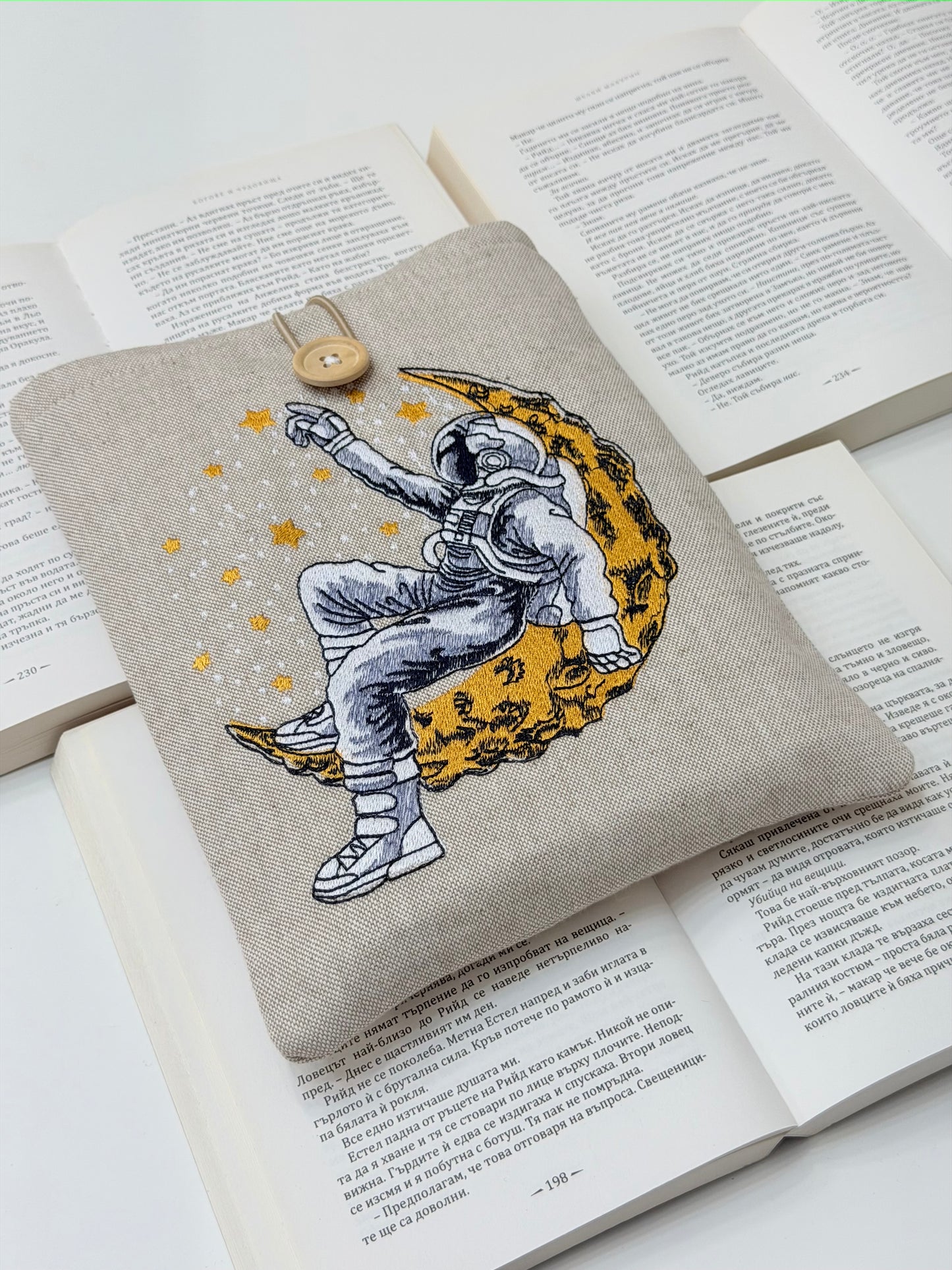 Embroidered Astronaut Book Sleeve – Padded Linen Book Cover, Cosmic Moon & Stars Design by Lullaby Crafts World