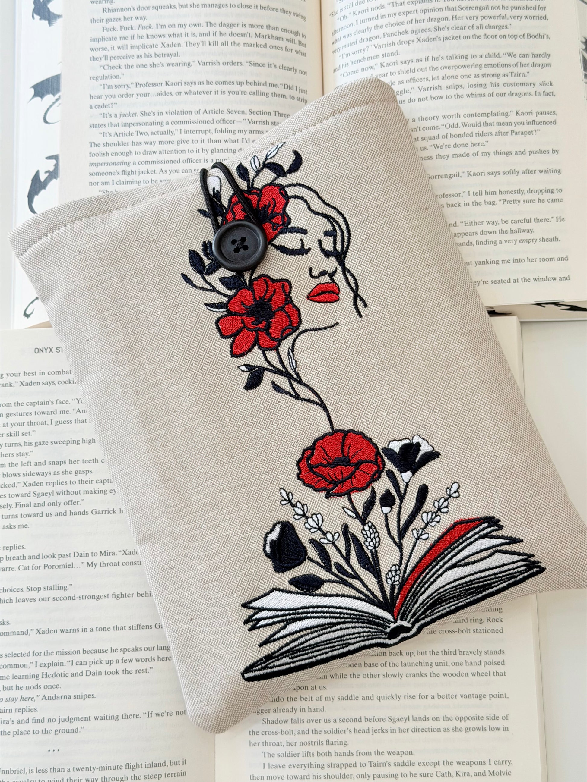 floral embroidery woman with roses and book