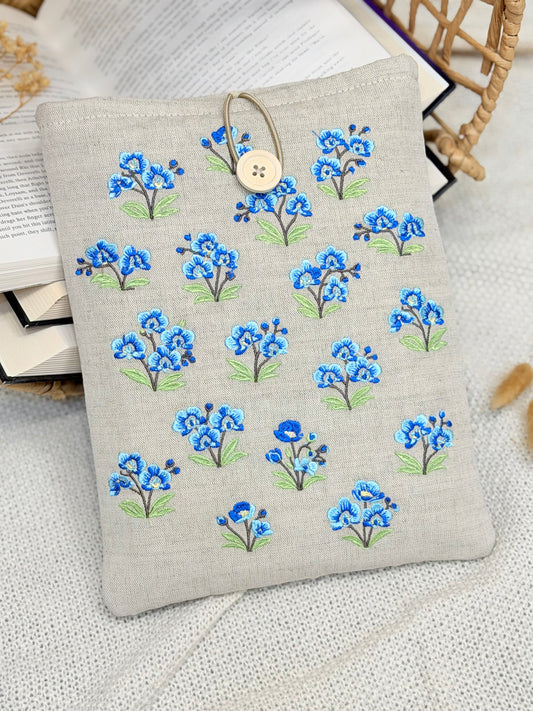 handmade embroidered blue orchid book sleeve with small floral design on linen fabric
