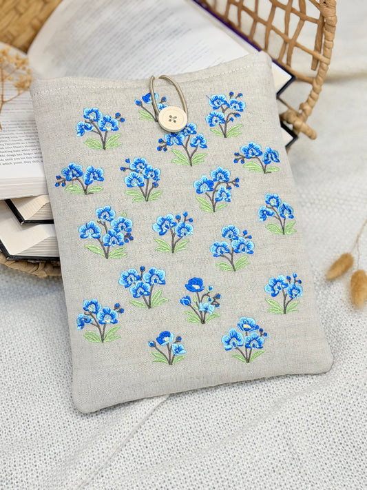 handmade embroidered blue orchid book sleeve with small floral design on linen fabric