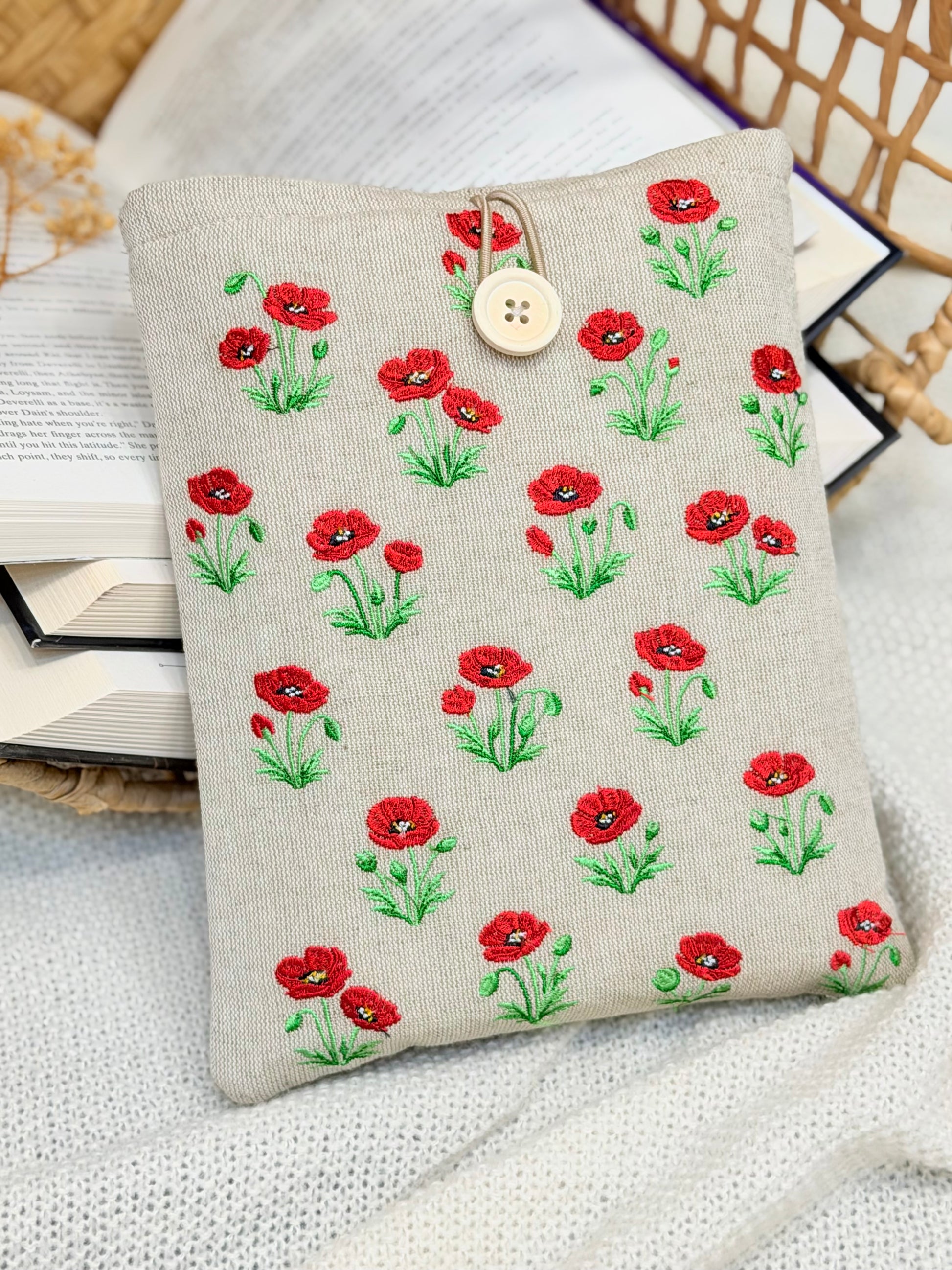 handmade embroidered poppy book sleeve with red flowers on linen fabric